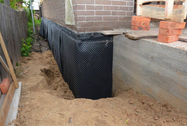 Happy homeowners after waterproofing job in Columbus Grove